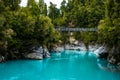 Hokitika Gorge, West Coast, New Zealand. Beautiful nature with blueturquoise color water and wooden swing bridge