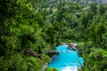 Hokitika Gorge, West Coast, New Zealand. Beautiful nature with blueturquoise color water and wooden swing bridge Royalty Free Stock Photo