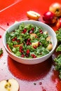 Hokkaido apple and quinoa salad with kale, pomegranate, spring onion and toasted sunflower seeds. Healthy homemade food. Vegan Royalty Free Stock Photo