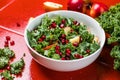 Hokkaido apple and quinoa salad with kale, pomegranate, spring onion and toasted sunflower seeds. Healthy homemade food. Vegan Royalty Free Stock Photo