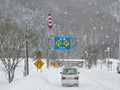 Fixed-post delineators or fletchings used on a road in Hokkaido, Japan