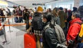 Crowd of tourists waiting for check in front of Jetstar airline counter Royalty Free Stock Photo