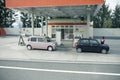 hokkaido japan - octobor5,2018 : two mini citycar refuel in eneos gas service hokkaido japan