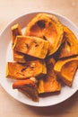 Hokkaido pumpkin slices baked with herbs and salt