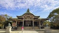 Hokoku-jinja Japanese shrine with trees on bright blue sky background Royalty Free Stock Photo