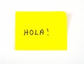 Hola! written on a sticky note Royalty Free Stock Photo