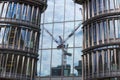 Holborn office building with crane reflection