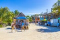 Holbox island beach sandbank bars stores restaurants people Mexico