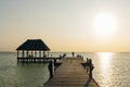 Holbox Island pier palapa sunset beach in Mexico Quintana roo Royalty Free Stock Photo