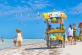 Fruit and mango seller on Holbox island beach sandbank Mexico