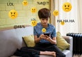 Teen mental health problem, social media harassment concept. A preteen schoolboy, teenager using smartphone alone feeling frustrat Royalty Free Stock Photo