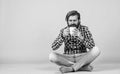 Hold cup of coffee or tea. lifestyle concept. handsome hipster man with cup of coffee. he is taking a coffee break Royalty Free Stock Photo