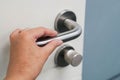 Hold doorknob to open the office door Royalty Free Stock Photo
