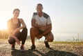 We hold each other accountable for our fitness goals. a fit young couple working out together outdoors. Royalty Free Stock Photo