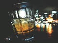 Hold a glass of beer on night city view background