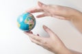 Hold the globe in your hands and protect the planet Earth Royalty Free Stock Photo