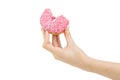 Hold Handing Delicious Pink Bitten Donut With Pink Cream Inside. Royalty Free Stock Photo