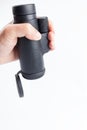 Hold a monocular telescope isolated Royalty Free Stock Photo