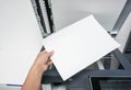Hold paper for printing document