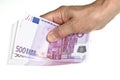 Hold stack of 500 euro in hand Royalty Free Stock Photo