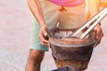 Hand hold tongs and ferret charcoal fire Royalty Free Stock Photo