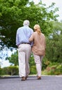 Hold on were going home. Rearview shot of a senior couple taking a walk.