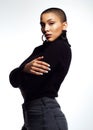 Always hold yourself in high regard. Studio shot of an attractive young woman posing with her arms folded against a grey