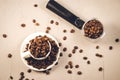 holder for coffee maker, cup and scattered beans/ holder for coffee maker, cup and scattered beans on stone background. Top view Royalty Free Stock Photo