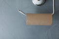 Holder with empty toilet paper roll Royalty Free Stock Photo