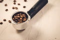 Holder filled with coffee beans/holder filled with coffee beans on a concrete background. Copy space Royalty Free Stock Photo