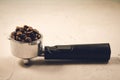 Holder filled with coffee beans/holder filled with coffee beans Royalty Free Stock Photo