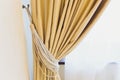 Holder for room curtains. Fragment photo curtain, interior detail, curtain detail close up. Royalty Free Stock Photo