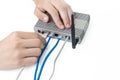 Holding ADSL router and connecting network plug Royalty Free Stock Photo