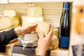 Holding a blue cheese at the store Royalty Free Stock Photo