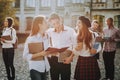 Holding Books. Standing in University. Girls. Boy Royalty Free Stock Photo