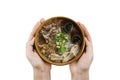 holding bowl Homemade noodle Vietnam food, Traditional Vietnamese soup and rice pudding on a wooden background, pork noodle rice Royalty Free Stock Photo