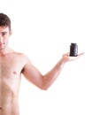 Holding a boxes with supplements on his biceps Royalty Free Stock Photo