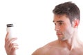 Holding a boxes with supplements on his biceps Royalty Free Stock Photo