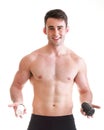 Holding a boxes with supplements on his biceps Royalty Free Stock Photo