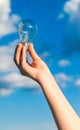 Holding a Bulb Royalty Free Stock Photo