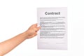 Holding business contract paper over isolated white background Royalty Free Stock Photo