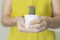 holding a cactus in his hands, two rings, concept complicated relationship Royalty Free Stock Photo