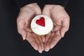 Holding a Cupcake with Love Hearts