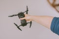 Holding DJI Mavic Air drone