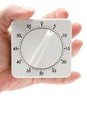 Holding an Egg Timer Royalty Free Stock Photo