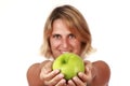 Holding a green apple Royalty Free Stock Photo