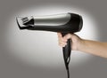 Holding a Hair Drier Royalty Free Stock Photo