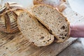 Sliced sourdough breads homemade on a wooden tray Royalty Free Stock Photo