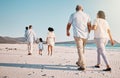 Holding hands, beach family and people walk, bond or enjoy time together for travel vacation, holiday peace or freedom Royalty Free Stock Photo