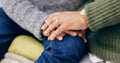 Holding hands, couple and bonding in close up for marriage, support and trust in relationship. Security, hope and care